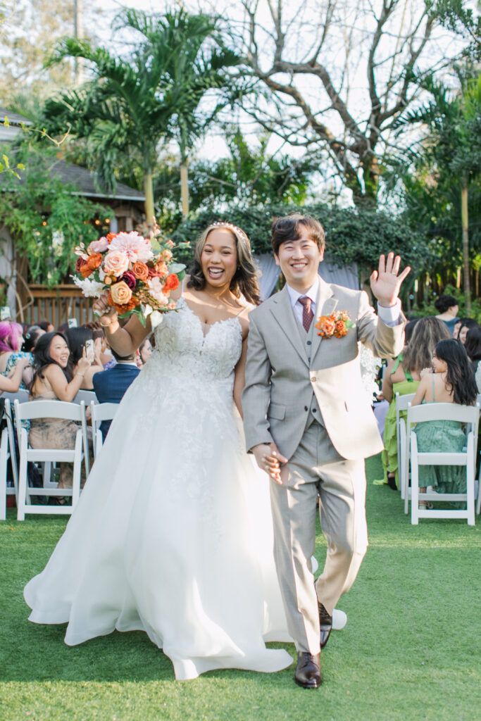 A wedding ceremony on the lawn at Rockledge Gardens