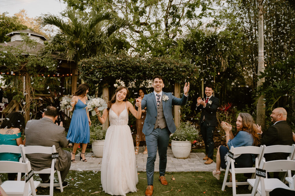A wedding ceremony on the lawn at Rockledge Gardens