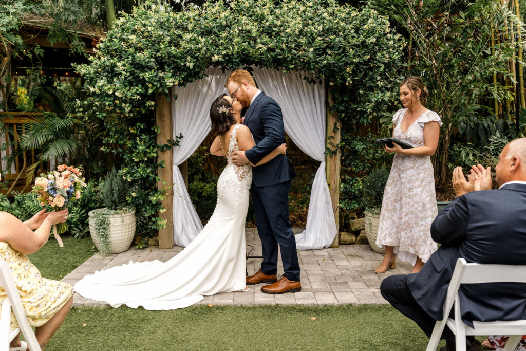 A wedding ceremony on the lawn at Rockledge Gardens